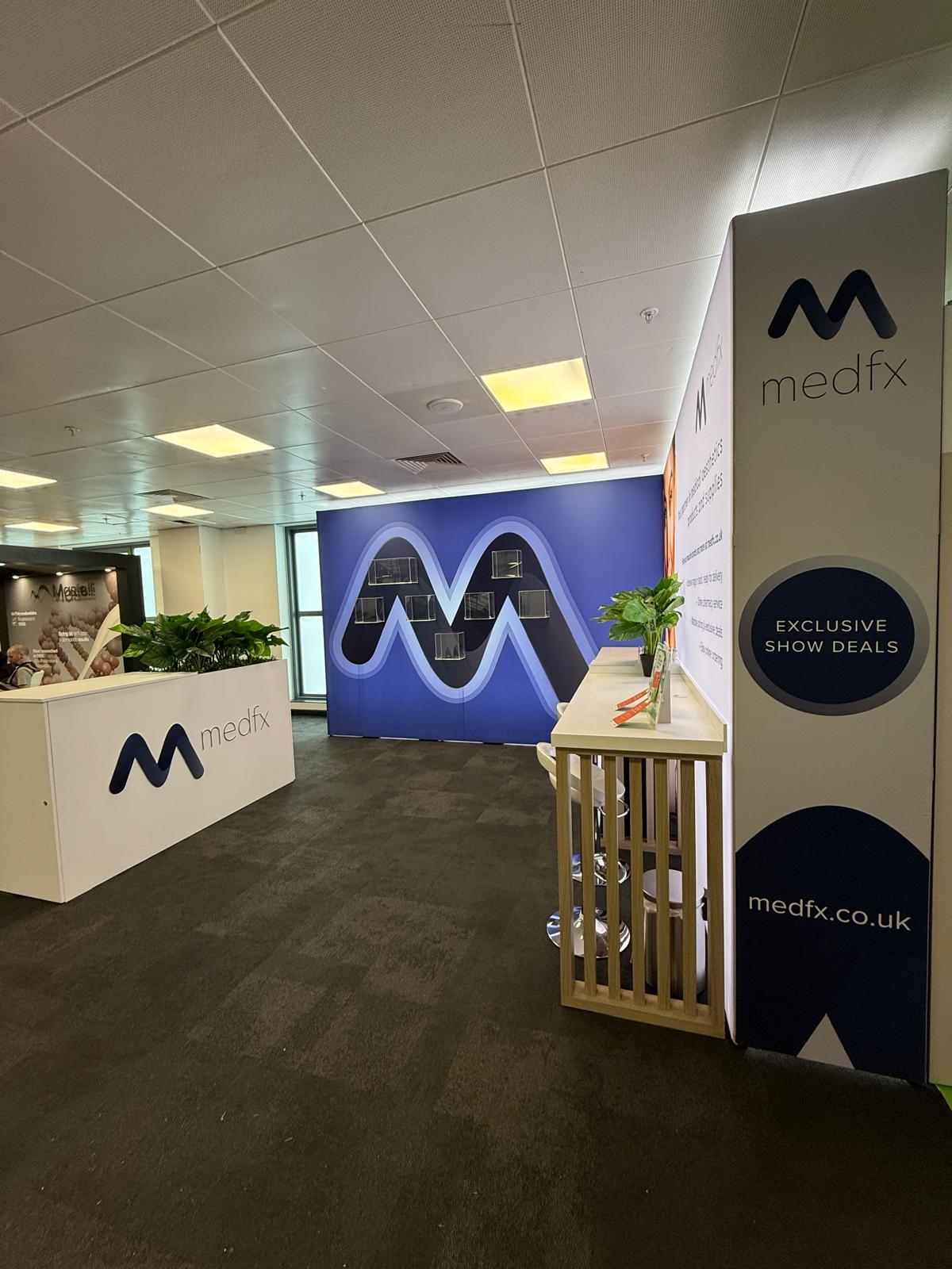 The 2025 Medfx stand. Clean, spacious, and filled with aesthetic products on display.